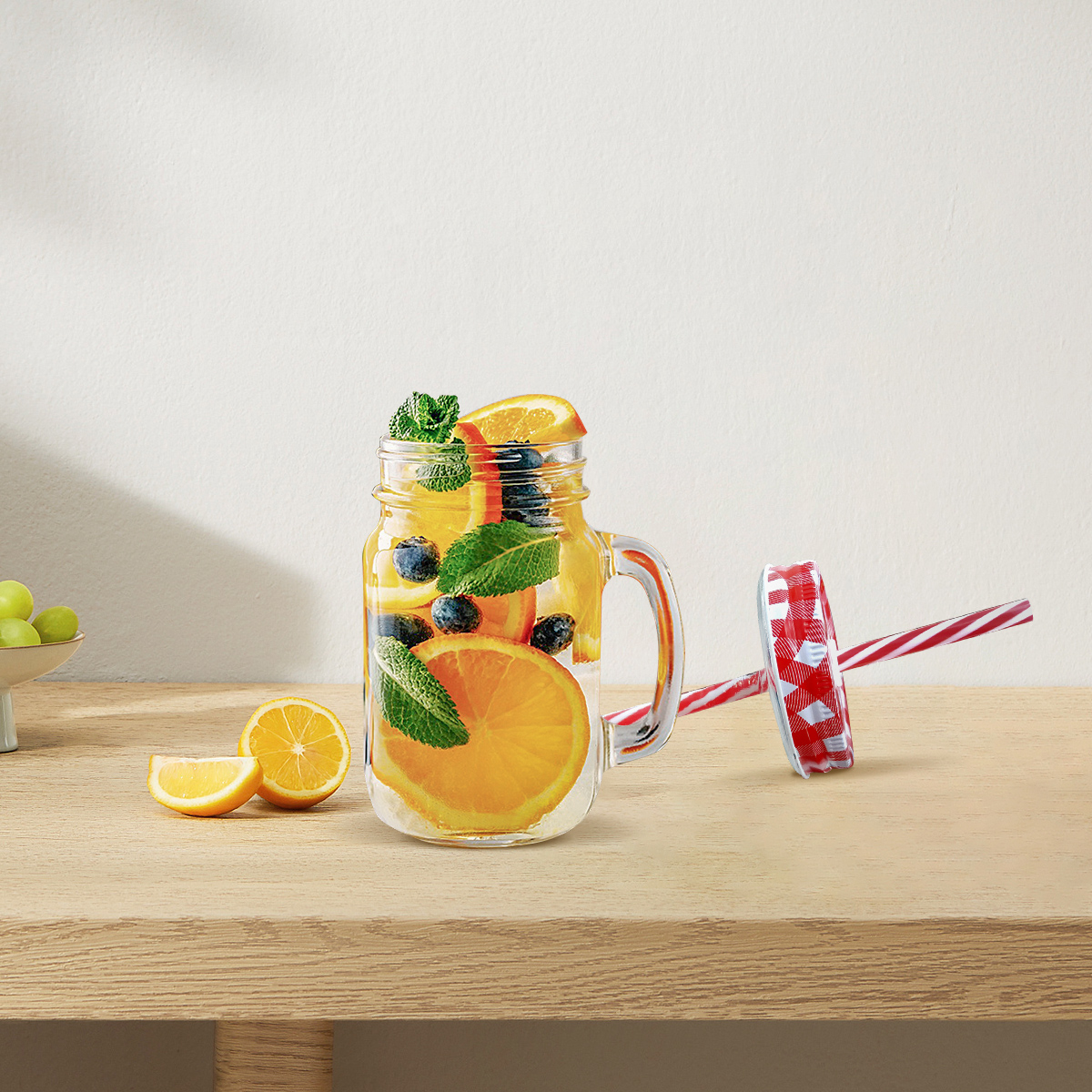 glass mason jar with handle and straw